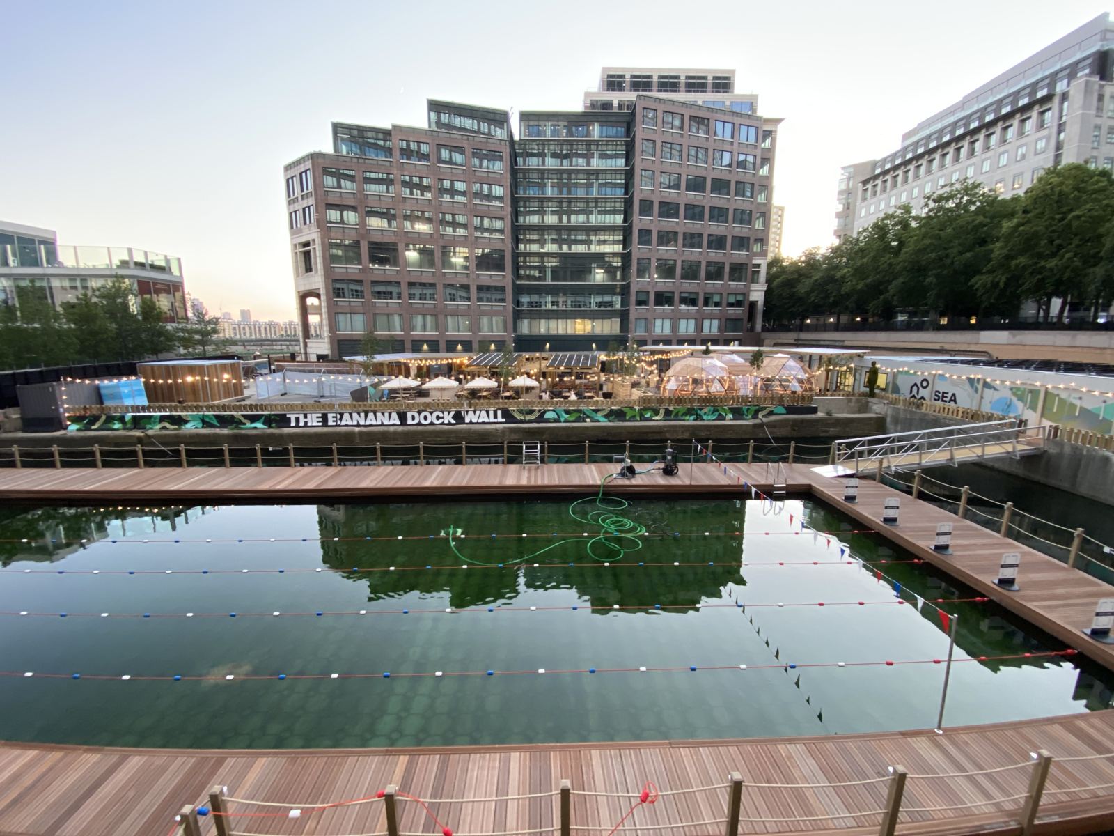 The completed terrace and domes reflected in Eden Dock