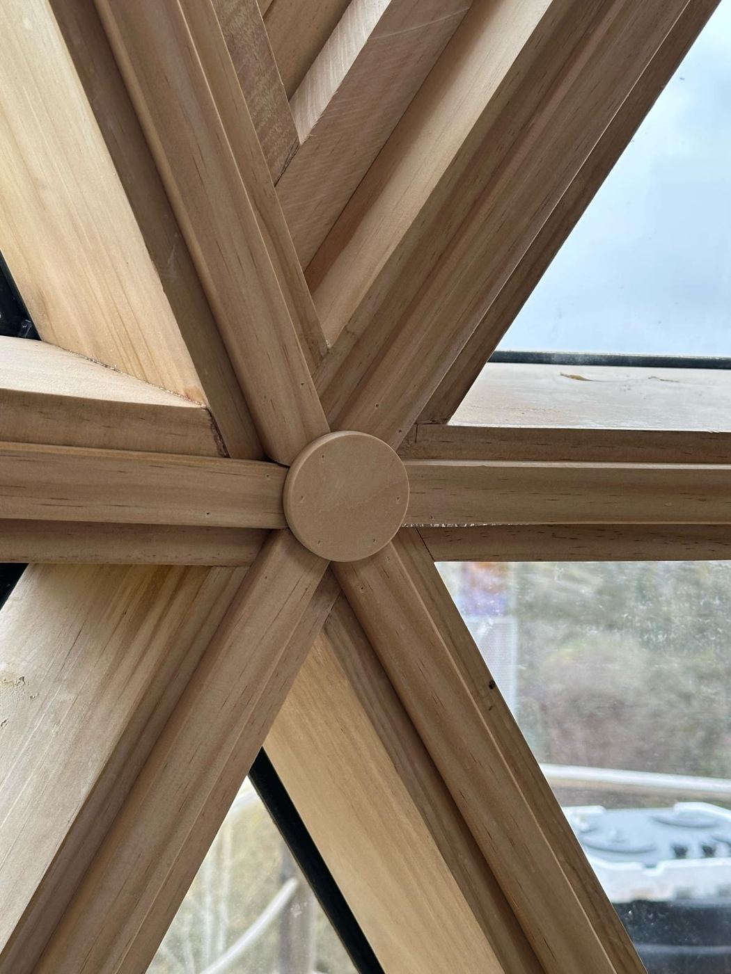 Close-up of the crafted timber hub joint