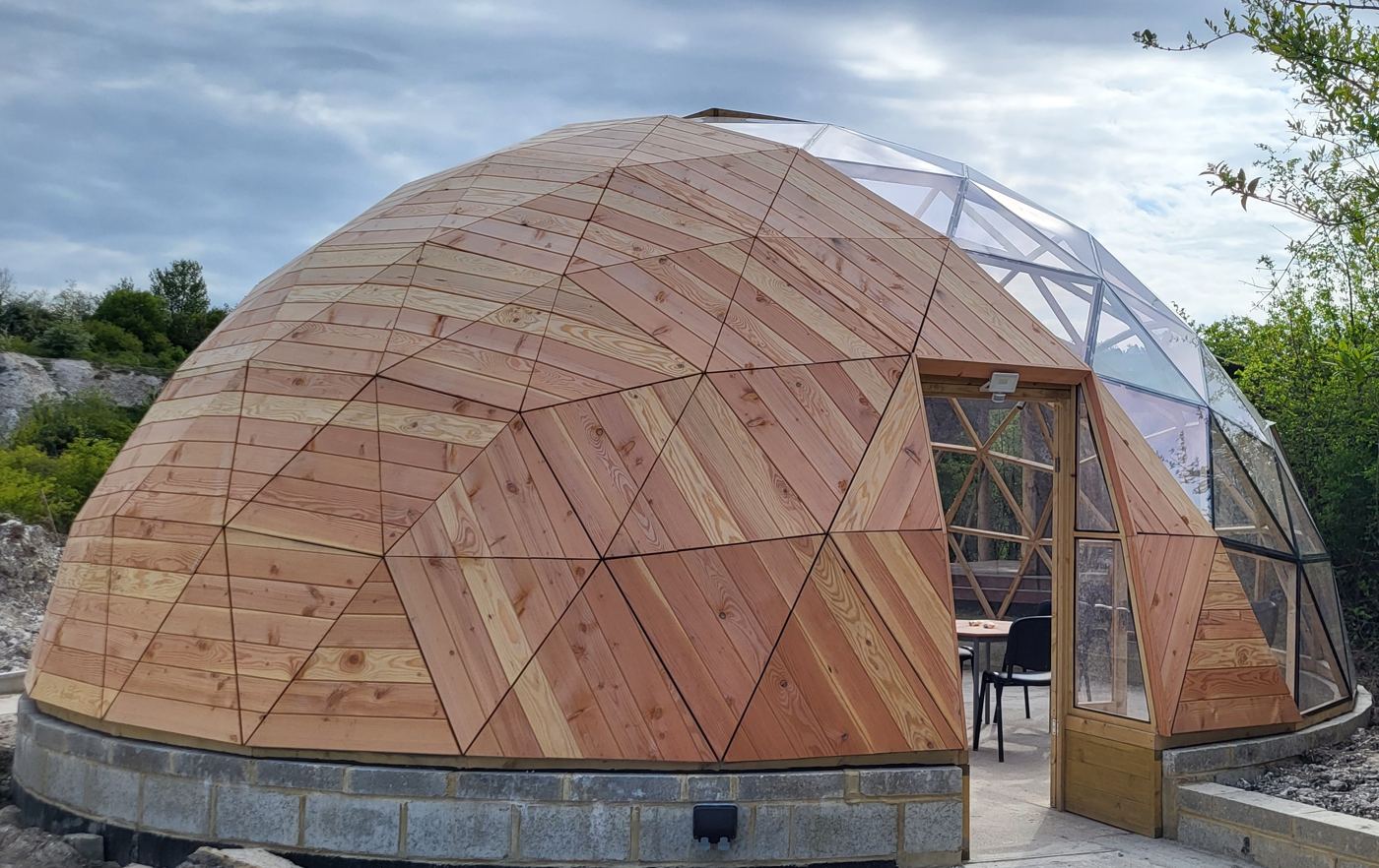 Finished cedar-clad Wilder dome with woven timber glazing screen